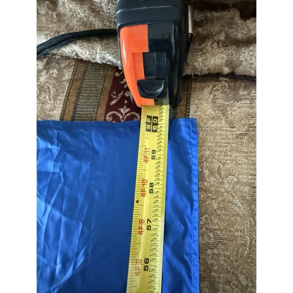 The BIG One Travel Puffer Throw in Travel Bag 60